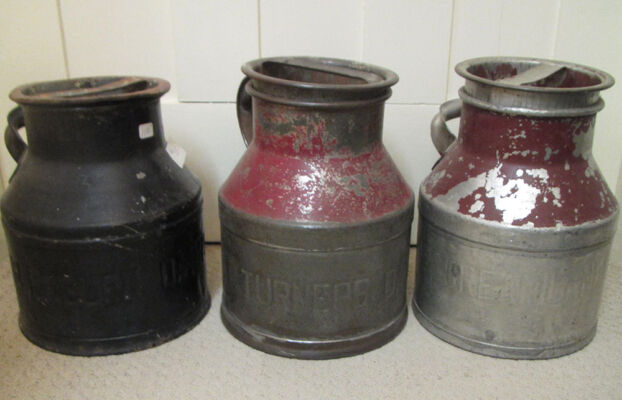Three 1-gallon cream cans: Royal City Creamery New Westminster (left), Turners Dairy (center), Creamland (right)