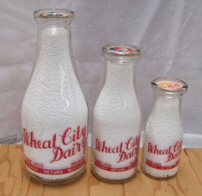 Wheat City Dairy, Brandon 3 sizes of bottles, red a.c.l. fronts